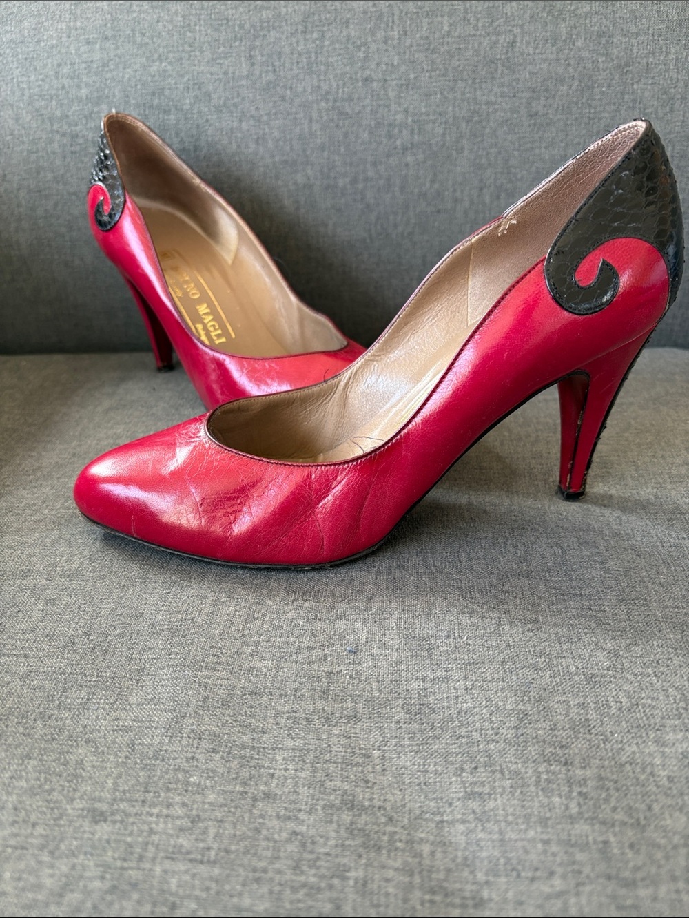 Bruno Magli Red Leather Pointed Pumps with Black Curl Heel Accent